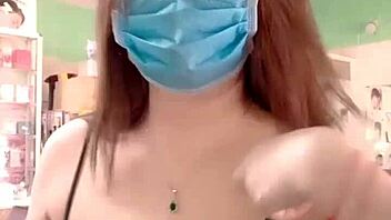 yên nhi trims hair with sexy big tits on display