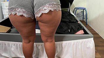 camera catches her arranging trunk in deep emotional surprise