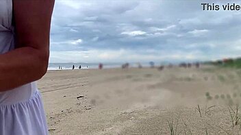 milf strokes big cock pov while crowds watch outdoor