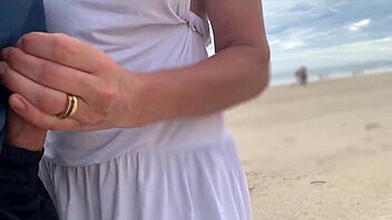 milf strokes big cock pov while crowds watch outdoor