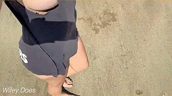 i walked the beach nude showing off my big milf tits