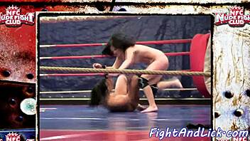 muscular lesbians wrestle catfight in boxing ring
