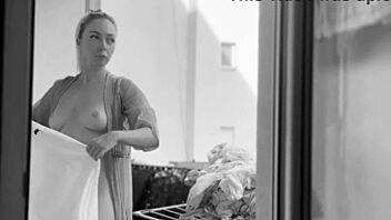 chubby naked woman flashes big shaved tits pussy hanging laundry balcony exhibitionist neighbors outdoor public boobs