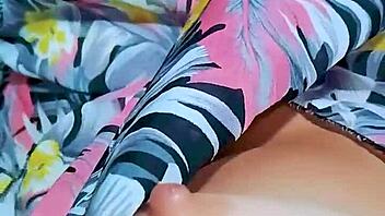 Pretty teen fingers her shaved pink pussy in office bathroom