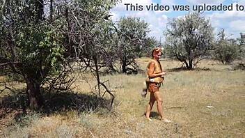 shy cosplay milf dances outdoors in aboriginal costume