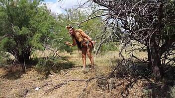 shy cosplay milf dances outdoors in aboriginal costume
