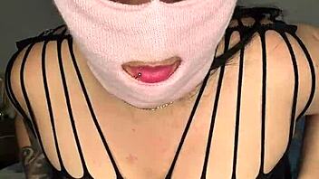 Hey, watch this naughty masked babe hammer her wet pussy!