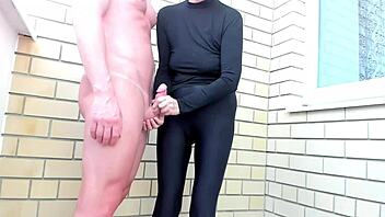 cfnm cougar in leggings strokes muscular stud's huge cock outdoors