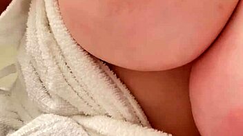 Big tits mom masturbates post-shower bliss