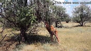 shy cosplay milf dances outdoors in aboriginal costume