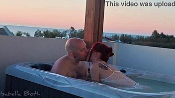 redhead couple kisses in jacuzzi giving wet blowjob 💦👅