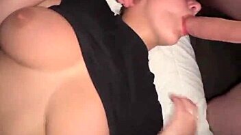 man cums on woman's big tits during shower blowjob session