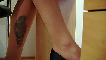 horny secretary elis teases with glass dildo through ripped pantyhose