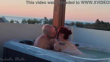 redhead couple kisses in jacuzzi giving wet blowjob 💦👅