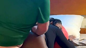 Ebony amateur slurps and rides white cock in hood bedroom