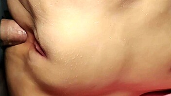 close up on her fat shaved pussy as the fuck doll takes double penetration toys deep