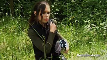 Hey, check out this curvy lesbian slave bound outdoors after getting caught