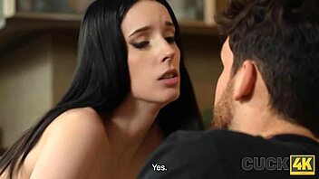 Shaved wife rides stranger's cock sideways while cuckold husband watches on sofa