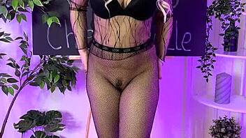 nylon club babe slips into fishnet tights teasing curvy legs