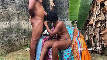 African beauty endures hot outdoor pounding in scorching heat