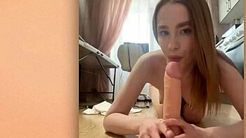 I'm sucking this dildo while fingering my tight ass!