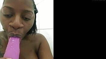 naejae's ebony milf body glistens as she sensually sucks dildo in steamy shower 💦🛁