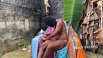 African beauty endures hot outdoor pounding in scorching heat
