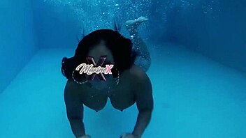 Maxine X Spreads Legs Revealing Big Pussy Lips and Tits