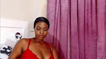 Curvy ebony babe rams huge dildo in tight ass