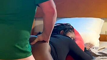 Ebony amateur slurps and rides white cock in hood bedroom