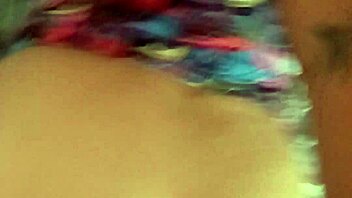 He lifts her dress to thrust cock into pussy in homemade Latina video