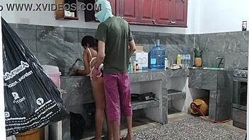 Oh god, watch this busty ebony maid masturbate her big natural tits in the kitchen!