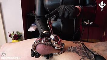 Empress Bella dominates caged tattooed slave