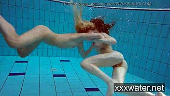 Milana and Katrin strip bikinis underwater at pool