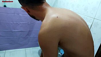 puts up bathroom curtain to watch curvy milf lick big cock
