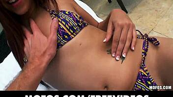 hey, watch this sunbathing babe slide bikini aside for gaping view?