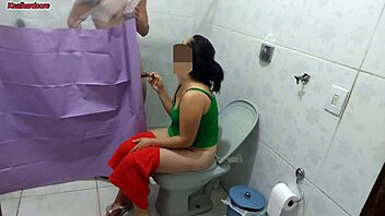 puts up bathroom curtain to watch curvy milf lick big cock