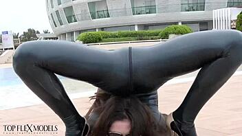 flexi latex doll stretches seductively in catsuit