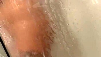 Teenager's steamy solo shower bathing tease unfolds softly