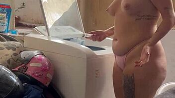 Neighbor spies chick washing with bare tits and fat pussy