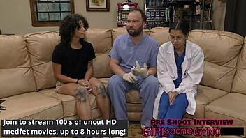 Nicole Luva tries on her doctor's fresh scrubs