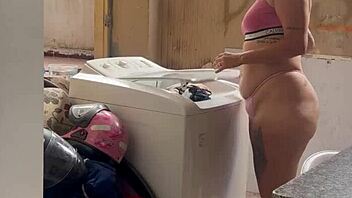 Neighbor spies chick washing with bare tits and fat pussy