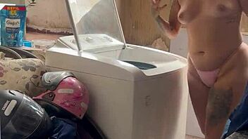 Neighbor spies chick washing with bare tits and fat pussy