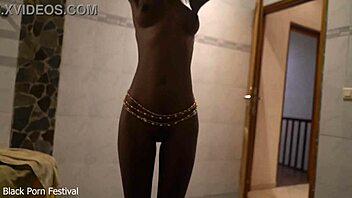 Dolcina seductively showers her skinny African tits and curves