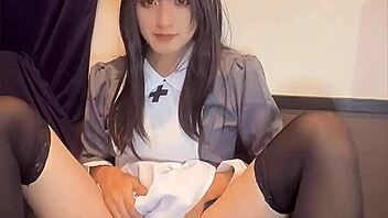 Black-haired nurse ladyboy masturbates quietly in solo crossdressing frenzy!
