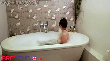 naughty british teen teases with dildo in steamy bath