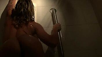 Blonde babe Dahlia masturbates in steamy shower solo fun
