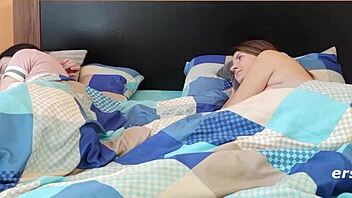 brunette wakes to lesbian friend masturbating in bed