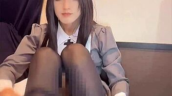 Black-haired nurse ladyboy masturbates quietly in solo crossdressing frenzy!