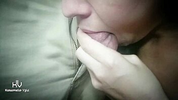 Cute amateur couple enjoys playful ball licking close-up in bedroom